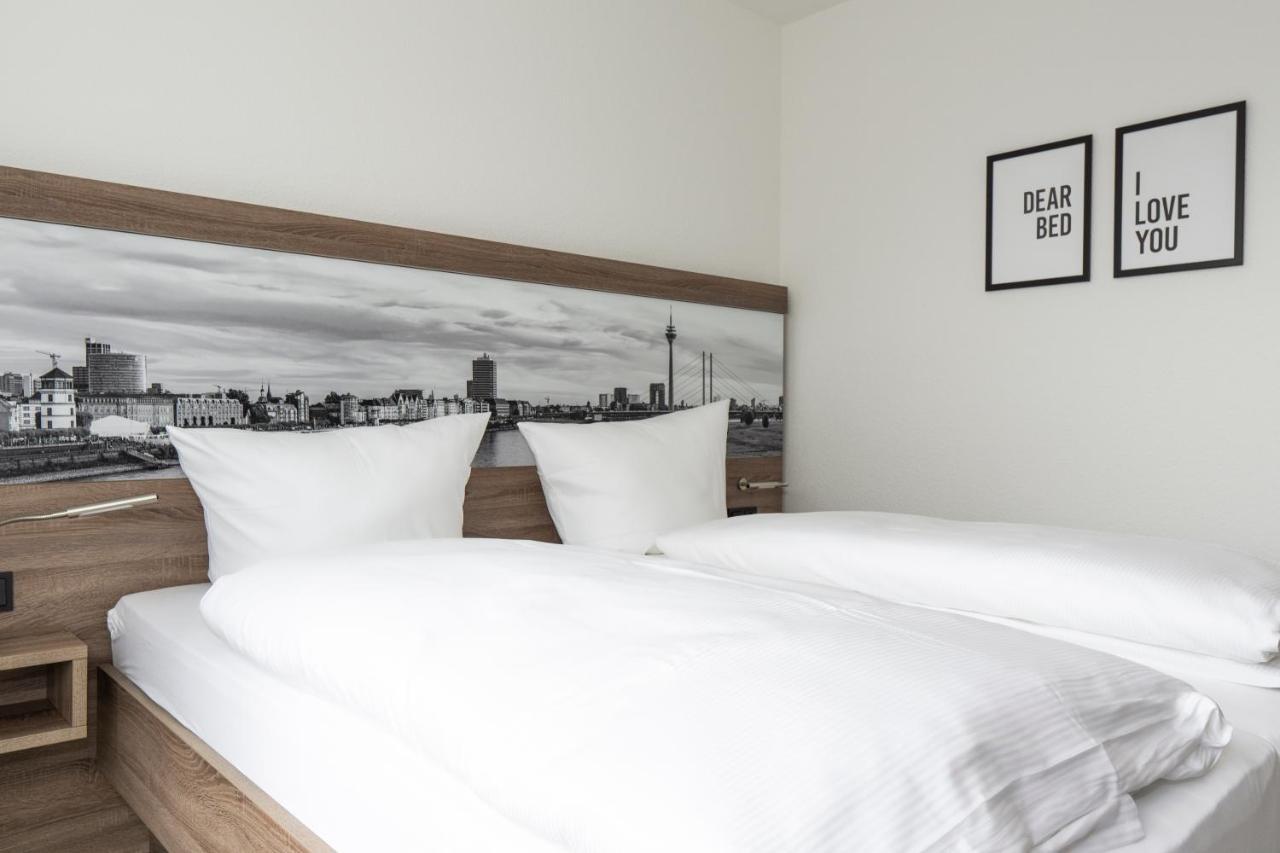 Boardinghouse Living28 Kaarst Aparthotel Bagian luar foto
